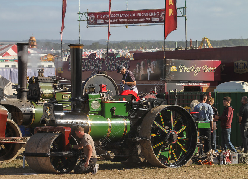 IMG 2942 
 The Great Dorset Steam Fair 2013. Cleaning the road rollers. 
 Keywords: Great Dorset Steam Fair 2013 GDSF Traction Engine Heritage Photography Photo Photos British Tarrant Hinton Cleaning Road Rollers Worlds Greatest Roller Gathering Chimney Boiler Green Wheel Wheels Driver Polish Clean