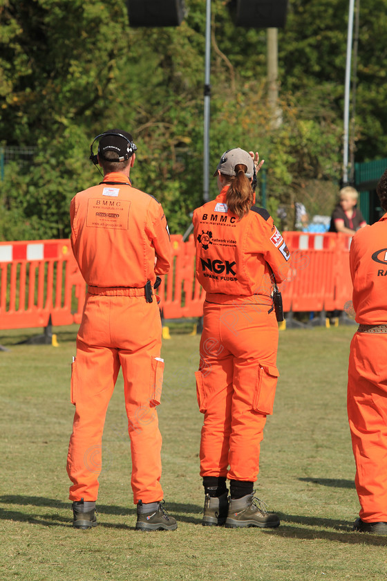 IMG 2259 
 Safety Marshalls at the Kop Hill Climb 2012. 
 Keywords: Safety Marshalls Kop Hill Climb 2012 Vintage Classic Car Competition Buckinghamshire Princes Risborough Orange Overalls Boots Caps