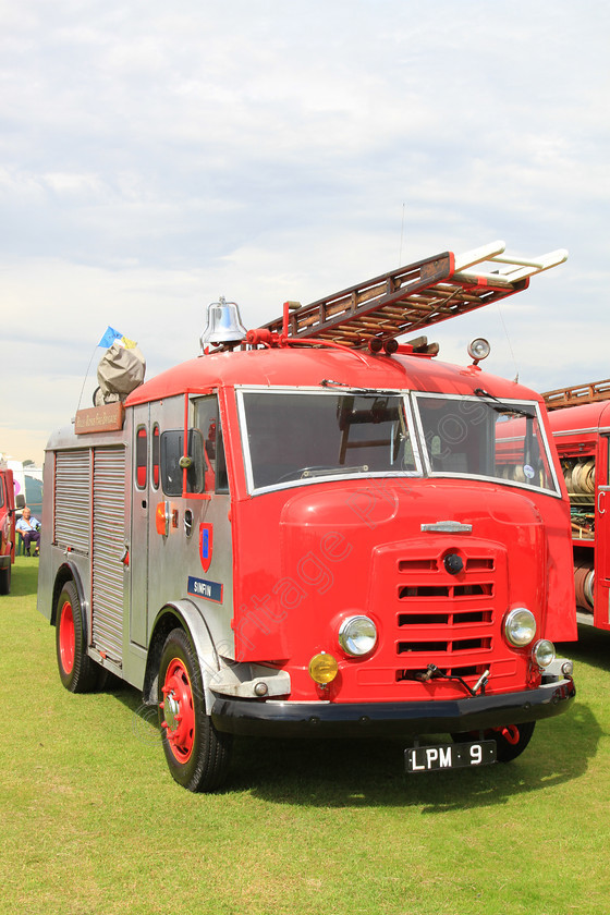 IMG 9421 
 Commer fire engine, built in 1956 reg no LPM 9. 
 Keywords: Commer Fire Engine Built 1956 Reg LPM 9 Red Ladder Emergency Vehicle Red Water Rescue Tender Wheel Wheels Tyre Tyres