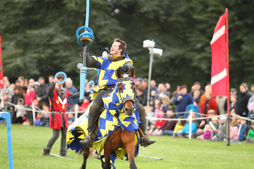 IMG 2467Blenheim Palace Jousting 
 'The Knights Of Royal England', Ring Lancing at Blenheim Palace 2012. 
 Keywords: Knights Royal England Blenheim Palace Jousting Mediaeval Lance Lancing Rings Horse Knight Helmet Armour Flag Flags Banner Blue Yellow Galloping Riding Chainmail Suit