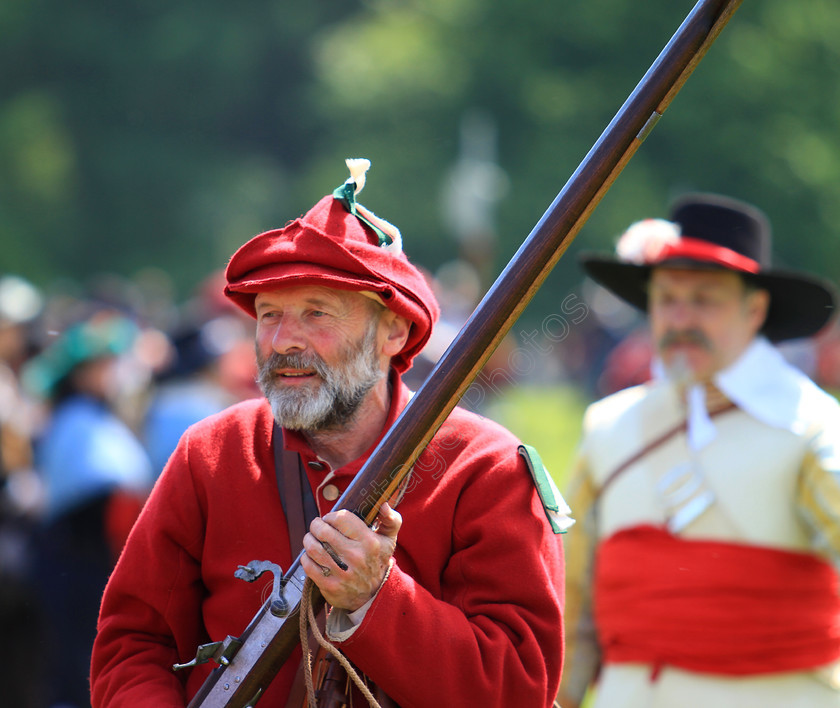 IMG 4682C 
 Civil War battle Re-enactment. 
 Keywords: Civil War Battle Re-enactment Reenactment Soldier Soldiers Blenheim Palace Sealed Knot Society Redcoat British Army Battle Of Blenheim 1704 Blues And Royals Musket Shot Weaponry Drill Staff Infantry Cavalry Artillery Uniform