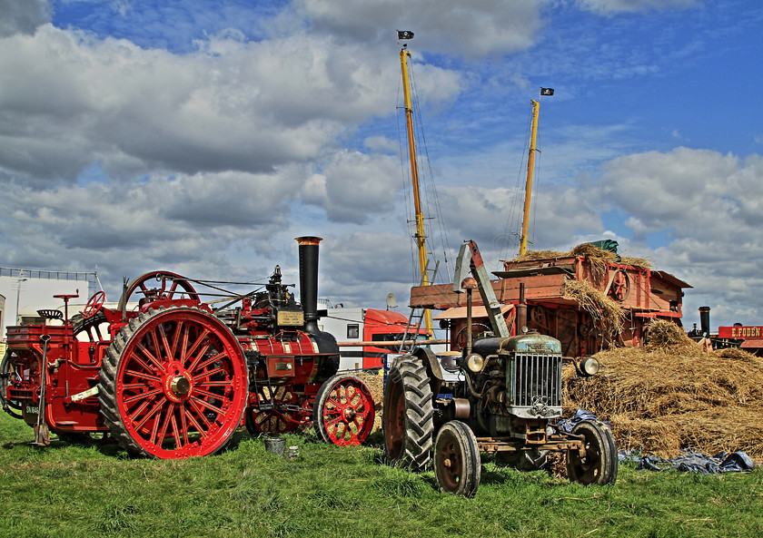 IMG 1657HDR 
 Threshing demonstration area at the Great Dorset Steam Fair. HDR. 
 Keywords: Threshing Demonstration Area Great Dorset Steam Fair GDSF HDR High Dynamic Range Photo Photography Farming Agriculture Steam Engine Tractor Hay Straw Clouds Wheel Wheels Chimney