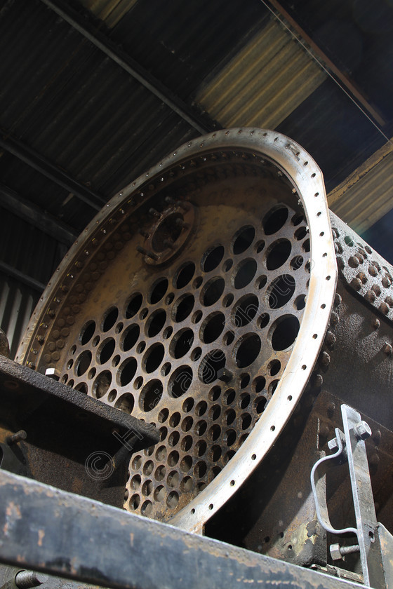 IMG 0077 
 Steam Train boiler undergoing restoration. 
 Keywords: Boiler Restore Restoration Steam Train Railway Workshop Engineering Metal Hole Holes