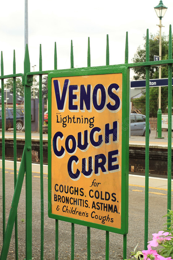 IMG 8302 
 Venos, 'Lightning Cough Cure' sign. 
 Keywords: Sign Signage Venos Lightning Cough Cure Yellow