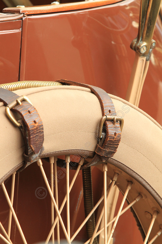 IMG 5038 
 Minerva Vintage car, spare tyre detail showing leather straps. 
 Keywords: Minerva Car Spare Wheel Leather Straps