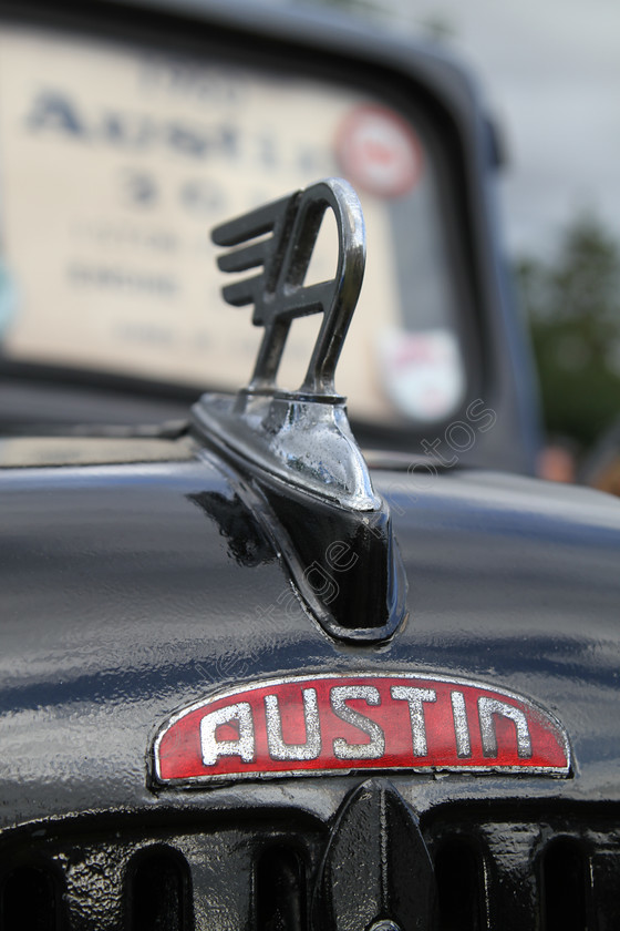 IMG 1387 
 Austin badge and logo detail. 
 Keywords: Austin Badge Logo Detail Red British Classic Car Insignia Radiator Black Engine Transport Vehicle