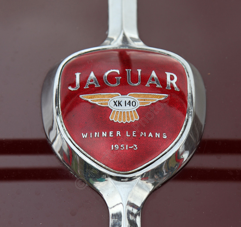 IMG 1458C 
 Jaguar XK 140 car badge. Winner Le Mans 1951-3. 
 Keywords: Jaguar XK 140 Car Badge Winner Le Mans 1951-3 1951 1953 Logo Insignia Classic Vintage British Manufacturer Red Chrome Silver Transport Vehicle Race Racing Driver