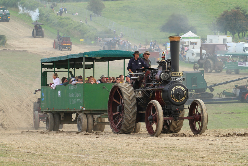 IMG 2326C 
 Visitors being transported around the Heavy Haulage Arena at the Great Dorset Steam Fair. 
 Keywords: Visitors Being Transported Around Heavy Haulage Arena Great Dorset Steam Fair GDSF Green Traction Engine Steam Pull Haul Wheel Tyres Green Black Chimney Passenger