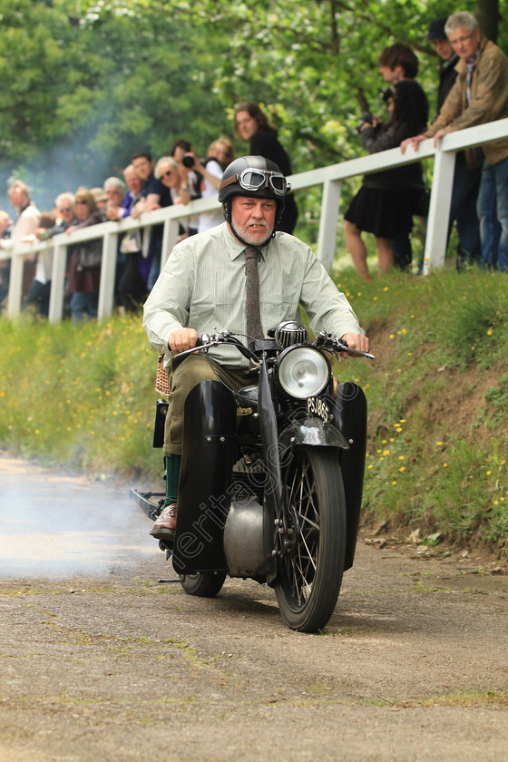 IMG 5221 
 Francis Barnett Motorbike at the Brooklands Double 12 Motorsport Festival on the test hill. 
 Keywords: Francis Barnett Motorbike Motorcycle Brooklands Museum Double 12 Motorsport Festival Engine Petrol Wheel Wheels Headlight Exhaust Fumes Helmet Goggles People Test Hill