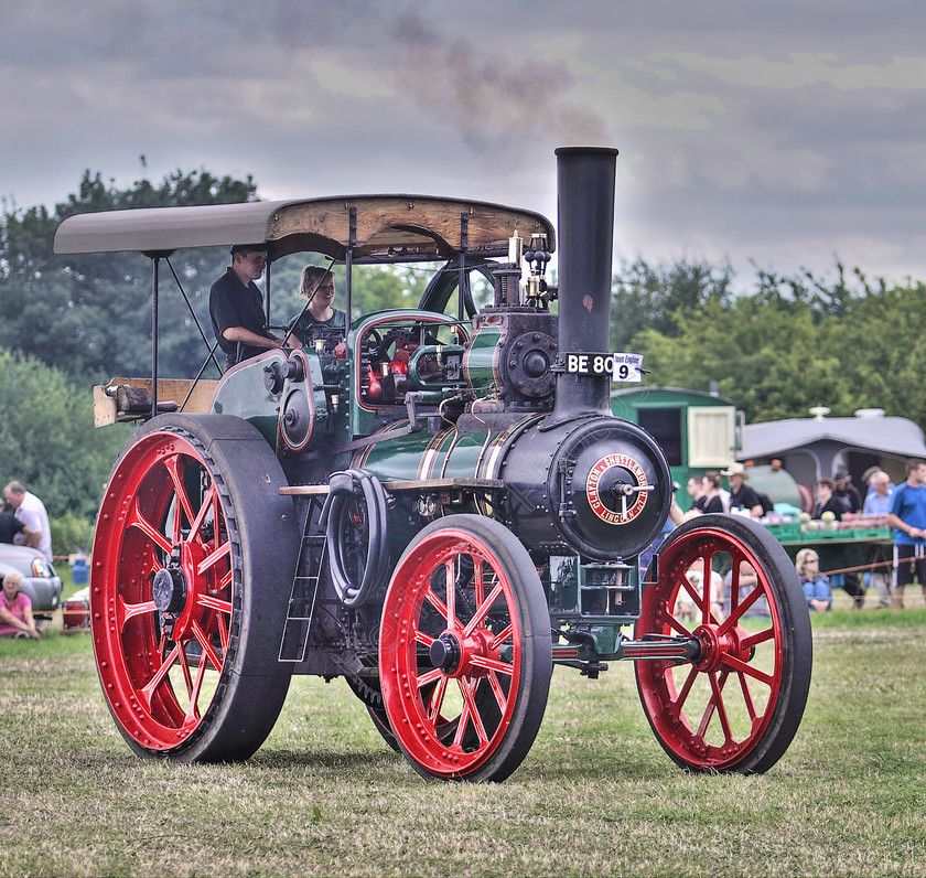 IMG 2189CHDR 
 Clayton & Shuttleworth Traction Engine 'The Gaffer', No 43200 built in 1910 reg no BE 8003. HDR. 
 Keywords: Clayton & Shuttleworth Traction Engine The Gaffer No 43200 Built 1910 BE 8003 HDR High Dynamic Range Photo Photography Canopy Red Green Black Gold Chimney Coal Steam Smoke Boiler Wheel Wheels Flywheel Governor Whistle Machine Machinery Pull Pulling Haul Haulage Transport