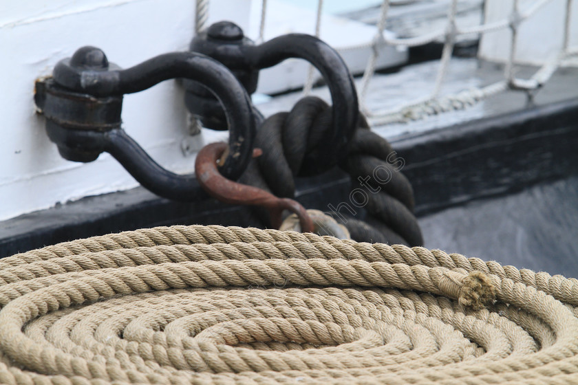 IMG 0366 
 Coil of rope on the deck of a ship. 
 Keywords: Ship Rope Rigging Deck Sailing Sailor Knots Knots Rig Boat