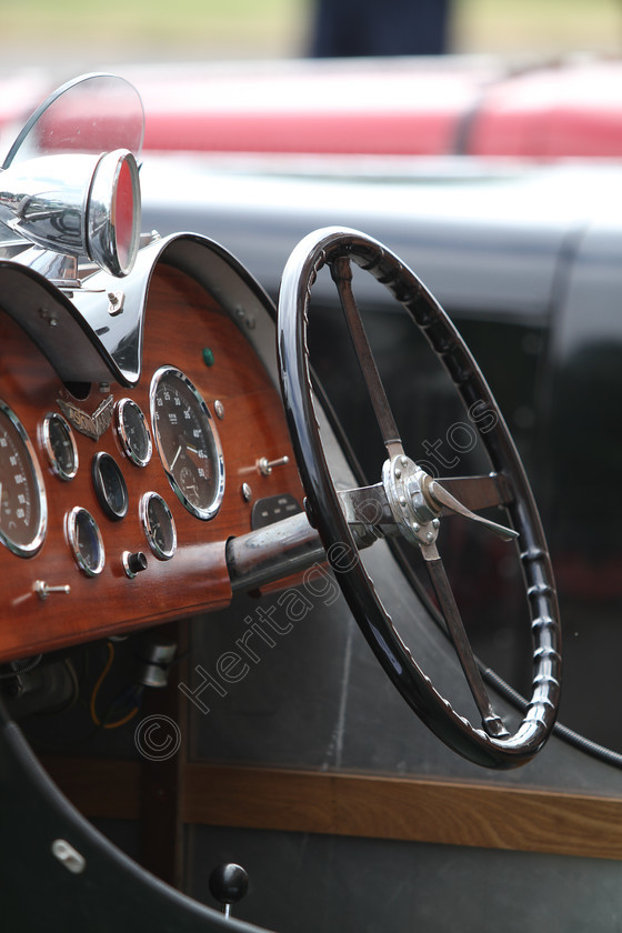 IMG 9861 
 Aston Martin vintage car dashboard and steering wheel. 
 Keywords: Aston Martin Vintage Car Dashboard Steering Wheel Classic British Wood Switches Dials Transport Chrome